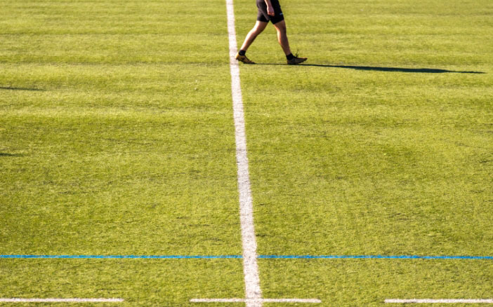 white-lines-on-a-playing-field-with-artificial-grass
